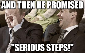 Putin-laughing-at-serious-steps-meme